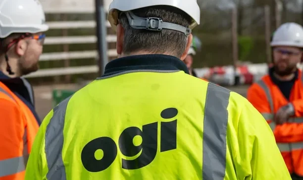 Ogi-written-on-back-of-broadband-engineer-jacket-uk